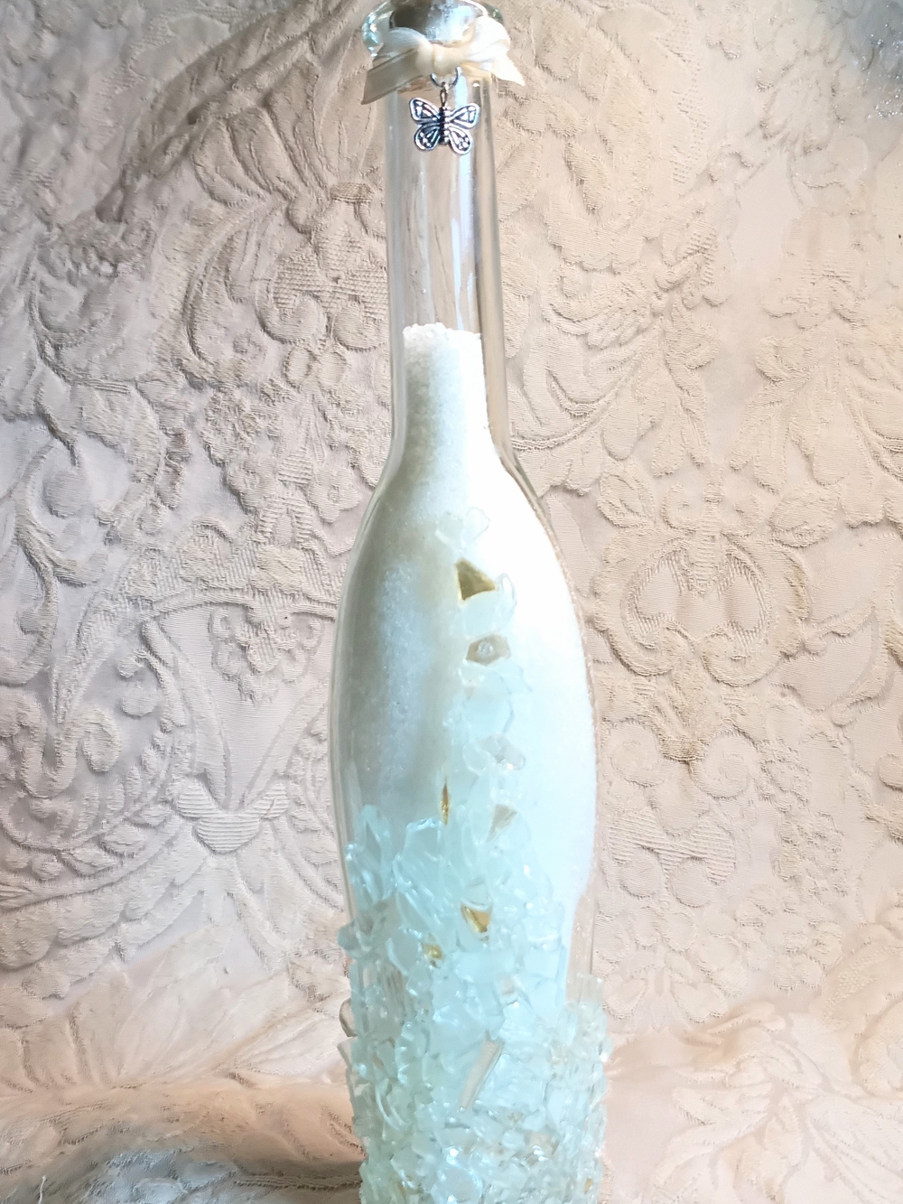 White Glass Decorative Bottle with Gold Accents and Butterfly Charm